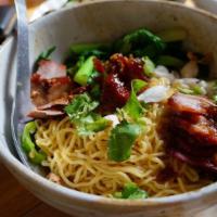 Ratchaburi Crab & Pork Noodle · Handmade egg noodles, roasted pork, crab meat, yu choy, and scallion. Recommended as dry noo...