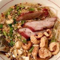 **Sukhothai Pork Noodle · Medium spice. Thin rice noodles, roasted pork, long bean, bean sprout, peanut, dried shrimp ...
