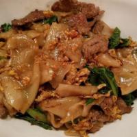 Pad See Ew · Not spicy. Flat rice noodle, Asian broccoli, collard greens, egg, yellow bean soy sauce.

Pl...