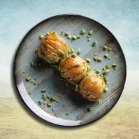 Baklava Boom · The traditional honey-soaked pastry which is filled with walnuts and almonds. A piece of del...