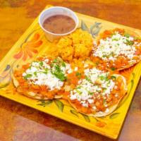 Huevos Rancheros · Tortillas de Maiz, Cebolla, Tomate, aguacate y Salsa, Onions, Tomato ,avocado , and Salsa. S...