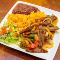 Bistec De Res A La Mexicana · Served with rice, beans and salad.