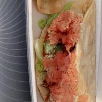 Taco Sushi · 2 tacos with fresh salmon and fresh tuna topped with a perfect combination of our homemade s...