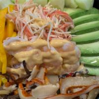 Shrimp Ika Bowl · Sushi shrimp, ika salad, spicy kani, cucumber, avocado, and mango. Served with Japanese dres...