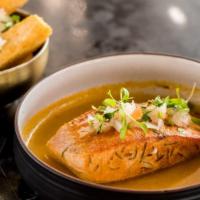 Grilled Salmon · Gluten-free. Wild caught fillet in a passion fruit reduction sauce. Served with yuca fries o...