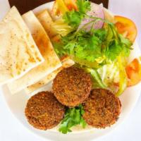 Falafel (5) · Seasoned mixture of crushed garbanzo beans, parsley, garlic, onion and Mediterranean spices....