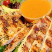 Louie'S Tropical Island Salad · Grilled chicken, avocado, cilantro, mixed greens, mandarins, tomatoes, and citrus dressing. ...