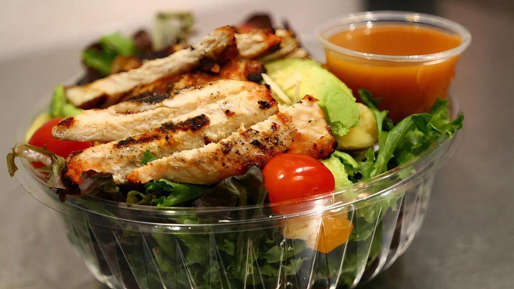 Surf'S Up Salad · Grilled chicken, mixed greens, fresh pineapples, mandarins, avocado, tomatoes, almonds, and citrus dressing. Add extra chicken, steak, or salmon for an additional charge.