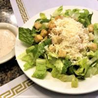 Caesar Salad · Served with toasted pita and choice of dressing.