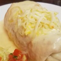 Chimichanga Queso Lover · Flour tortilla filled with cheese, shredded beef, Mexican rice, then fried crispy topped wit...