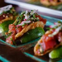 Tuna Poke Wonton Tacos · Cilantro, Radish, Wasabi Kewpie