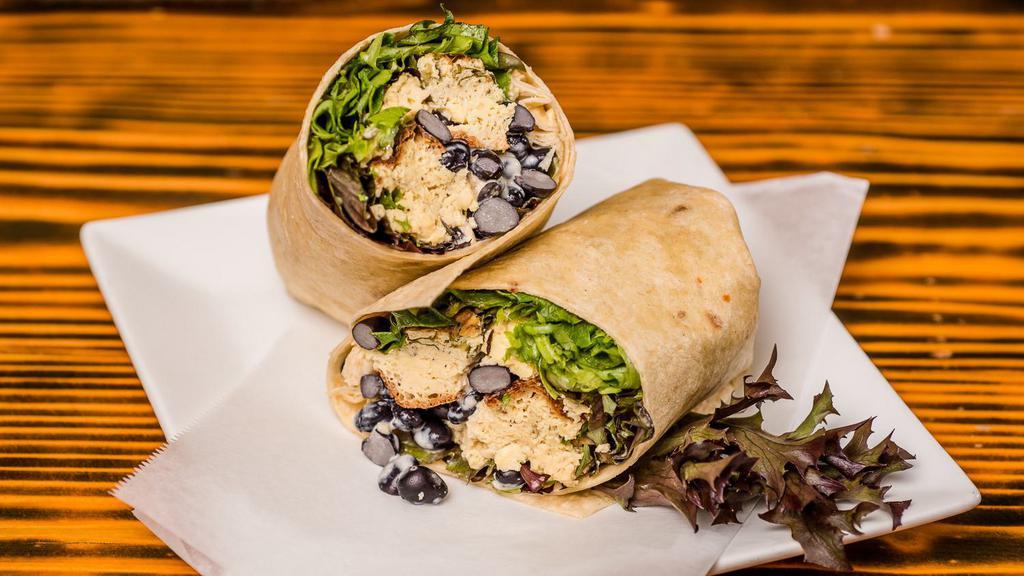 Breakfast Burrito · Whole wheat wrap, sweet chili mayo, black beans, mixed greens and homemade egg bake. Vegetarian. Served daily until 11 AM.