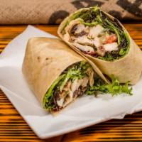 Chicken Salad Wrap · Chicken, mayo, celery, dried cranberries, red onion, and mixed greens on sundried tomato bas...