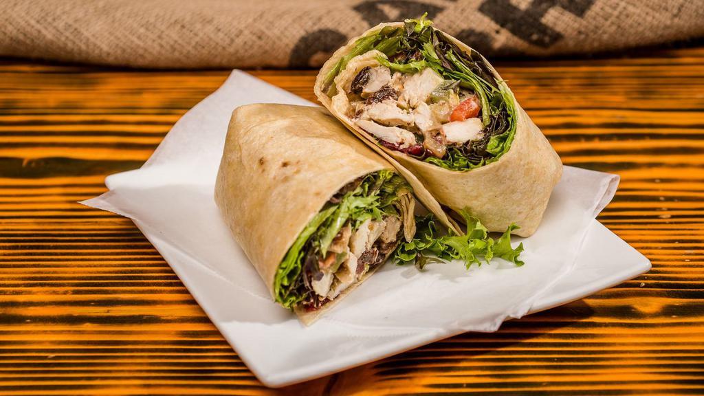 Chicken Salad Wrap · Chicken, mayo, celery, dried cranberries, red onion, and mixed greens on sundried tomato basil wrap.