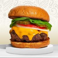 Cheesy For Me Burger · American beef patty topped with melted cheese, lettuce, tomato, onion, and pickles. Served o...