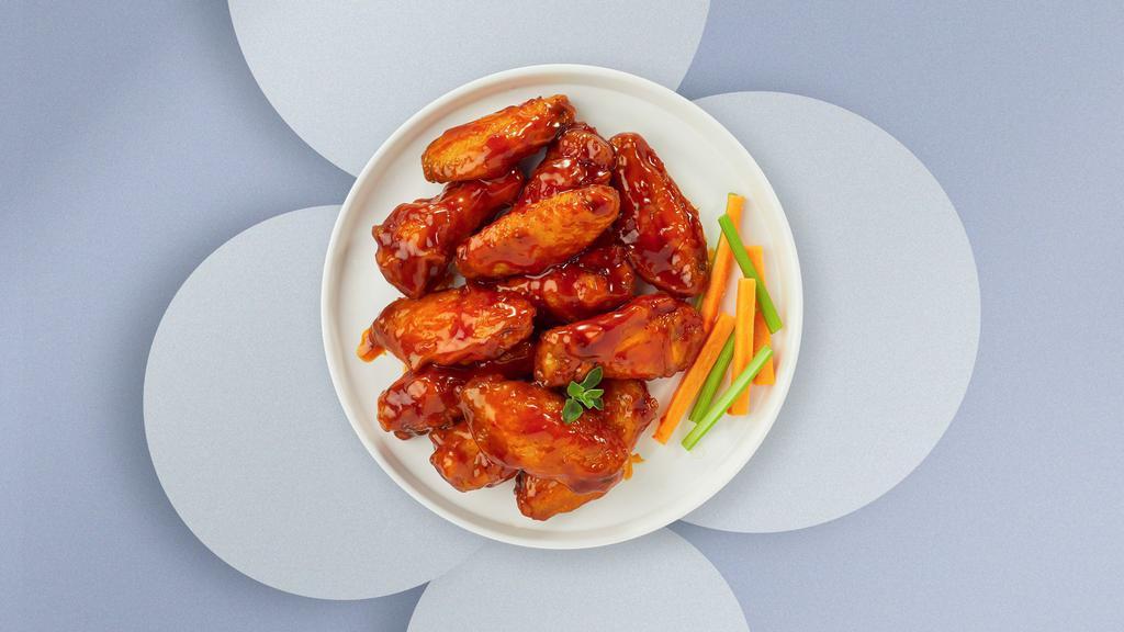 Buffalo Chicken Wings · Five wings cooked and tossed in our buffalo wing sauce. Served with Blue Cheese.