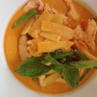 Scarlet Curry · Simmered spicy red coconut curry with eggplant, bamboo shoot, jalapeño, string bean and basil.