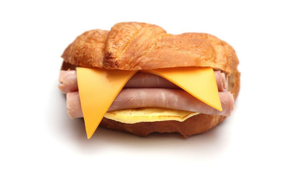 Ham, Egg & Cheese Sandwich · Sizzling strips of ham, eggs, and melted cheese on customer's choice of bread.