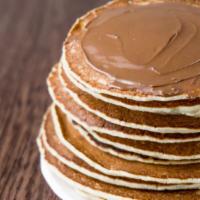 The Nutella Pancakes · Fluffy buttermilk pancakes topped nutella, syrup and butter.