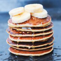 The Banana Pancakes · Fluffy buttermilk pancakes topped bananas, syrup and butter.