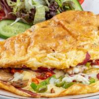 Pastrami Omelette · Sizzling pastrami, swiss cheese, peppers, and tomatoes.