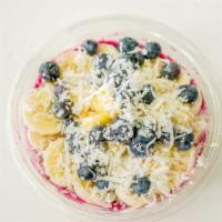 Island Bowl · Toppings: granola, banana, blueberry, pineapple, honey and coconut flakes.