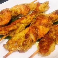 Chicken Satay · 4 pieces. Marinated chicken on skewers with lemongrass peanut sauce.
