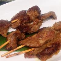 Beef Satay · 4 pieces. Marinated beef on skewers with lemongrass peanut sauce.