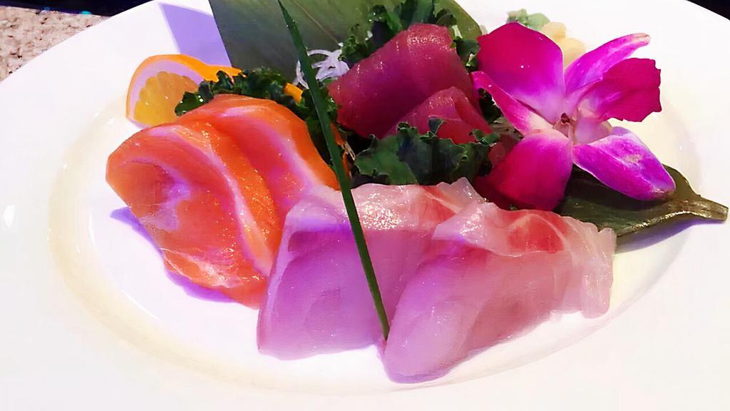 Sashimi Appetizer · 7 pieces salmon, tuna&white fish sashimi.