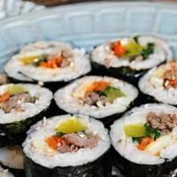 Beef Kimbap · Korean style roll with beef short rib, carrots, cucumbers and pickled daikon rolled with ric...
