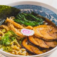 Shoyu Ramen · Chicken broth, soy sauce tare, pork belly, spinach, bamboo shoots and scallions. Hand squeez...