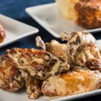 Alabama White Wings · A fan favorite! Smoked and fried jumbo chicken wings, with tangy Alabama White sauce on the ...