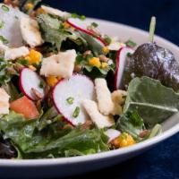 House Salad · Mixed greens, diced tomato, radish, cheddar, sunflower seeds, saltines, buttermilk parmesan ...