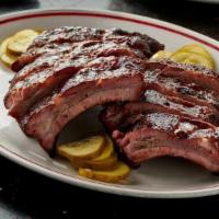 Memphis Baby Back Ribs · Dry rubbed and cherry smoked. Choose half rack or full rack