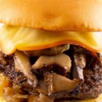 Mushroom Swiss · Certified Angus Beef - Served with sautéed mushrooms, caramelized onions, Swiss, mojo