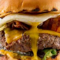 Triple D · Certified Angus Beef - Served with an over-easy egg, Applewood bacon, cheddar cheese, grille...