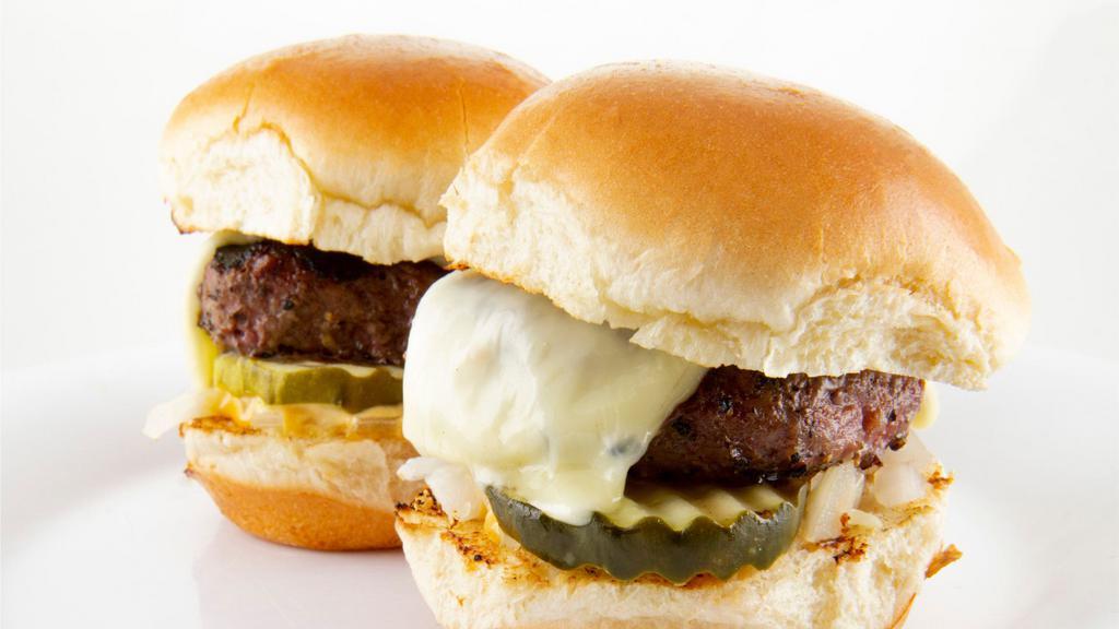 Sliders · (2) Mini versions of our signature burger with American cheese, chopped onions, pickles and mojo sauce