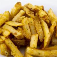 Garlic Parmesan Fries · Our skin-on potatoes fried to a golden brown, shaken in garlic sauce and topped with parmesa...