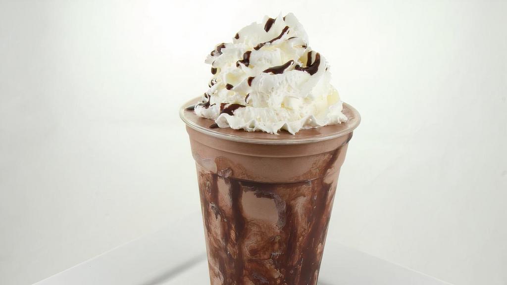 Chocolate Shake · Hand-dipped premium ice cream that is then hand-spun for an extra thick & creamy milkshake; topped with Hershey's chocolate sauce