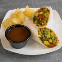 Vegan Vegetable Roll · Spinach, cauliflower, chickpeas, green peas and potato with tamarind sauce. Comes with chips...