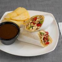 Tofu Masala Roll · Tofu, tomato, onions, peppers topped with cilantro, cumin and masala mix. Comes with tamarin...