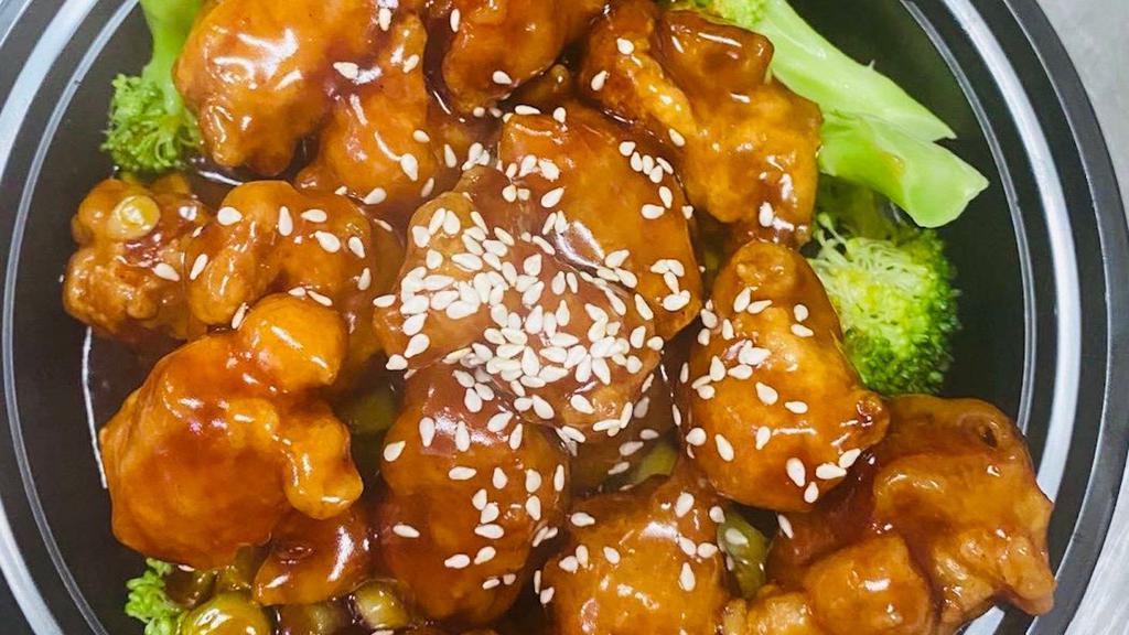 Sesame Chicken · Served with white rice or pork fried rice. wonton soup or egg drop soup or egg roll or soda.