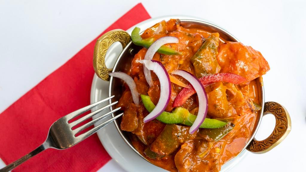 Chicken Curry · Chicken cooked in freshly grounded spices and lightly. Served with basmati rice.