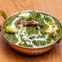 Saag Paneer · A delicious combination of homemade cheese and spinach.
