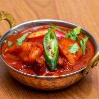 Beef Vindaloo · Juicy beef curry cooked with potatoes and hot spices.
