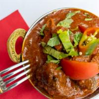 Chicken Tikka Masala · Favorite. Barbequed chicken cubes cooked in tangy sauce of tomatoes and onions. Served with ...