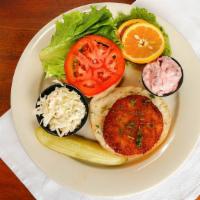 Crab Cake Sandwich · Our delicious homemade crab cake served on a kaiser roll with a cranberry tartar sauce.