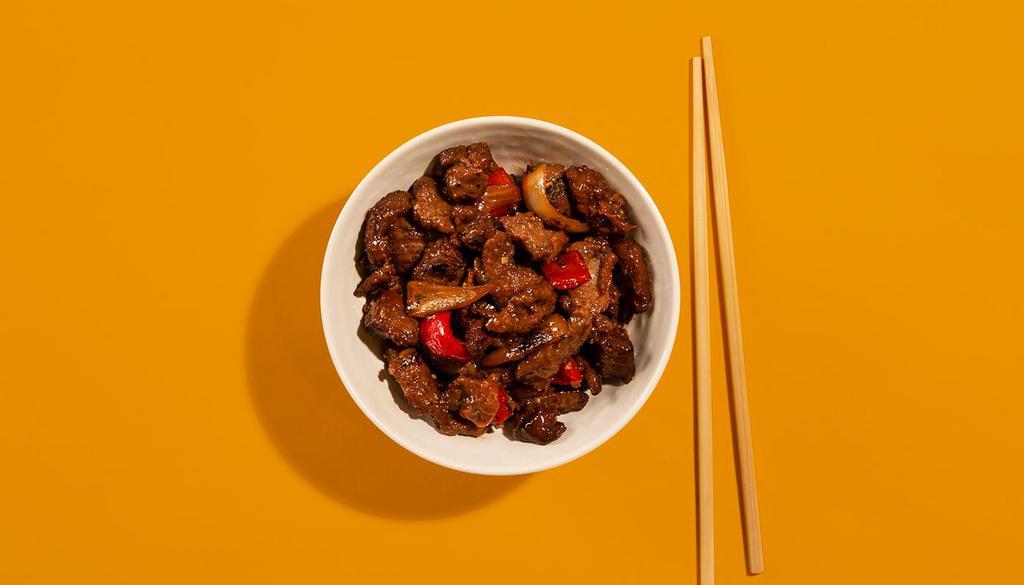 Black Pepper Beef · Stir-fried tender beef with onions in a garlic and black pepper sauce.