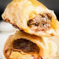 Beef Rolls · Housemade beef rolls with a flaky and crispy exterior.