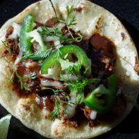 Mole · Chicken thigh, pickled jalapeno, mole negro, jack cheese, cilantro.